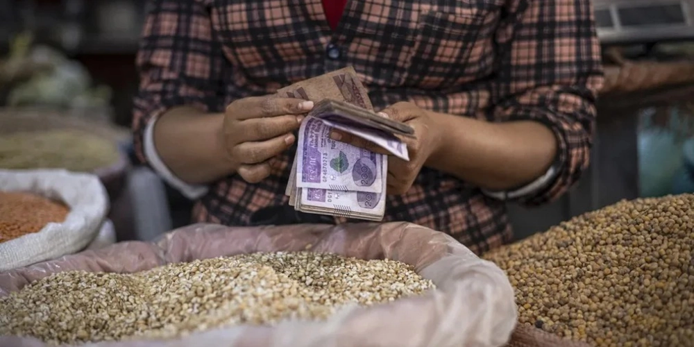 The Economic Straightjacket